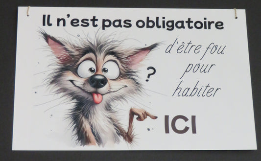 Panneau déco  "Il n'est pas obligatoire d'être fou pour habiter ici"